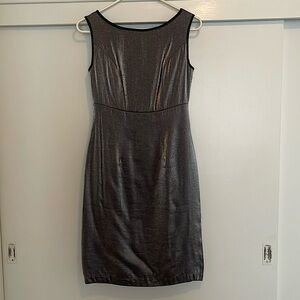 Sleeveless silver dress with open split on the side